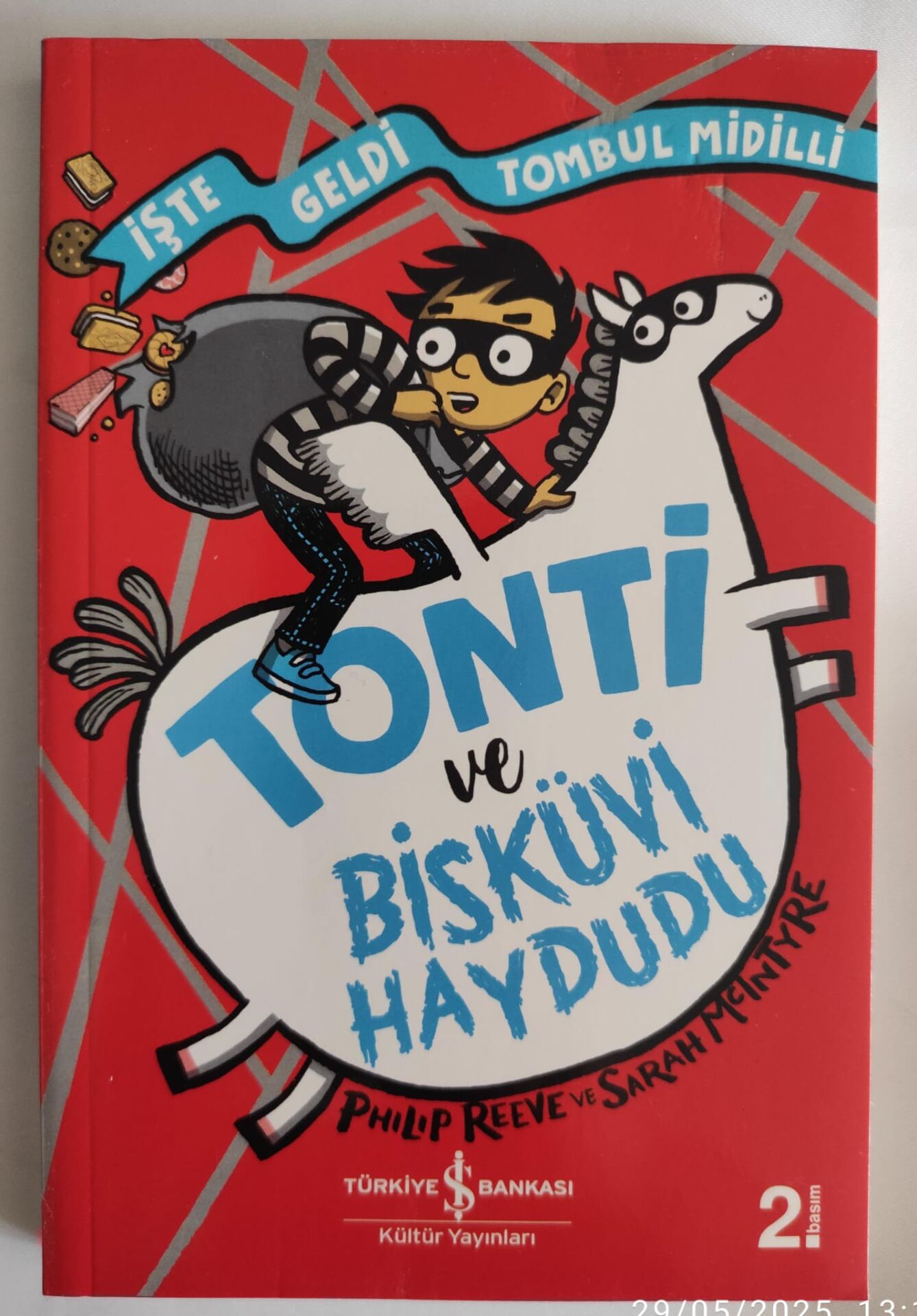 Phılıp reeve,Tonti ve Bisküvi Haydutu